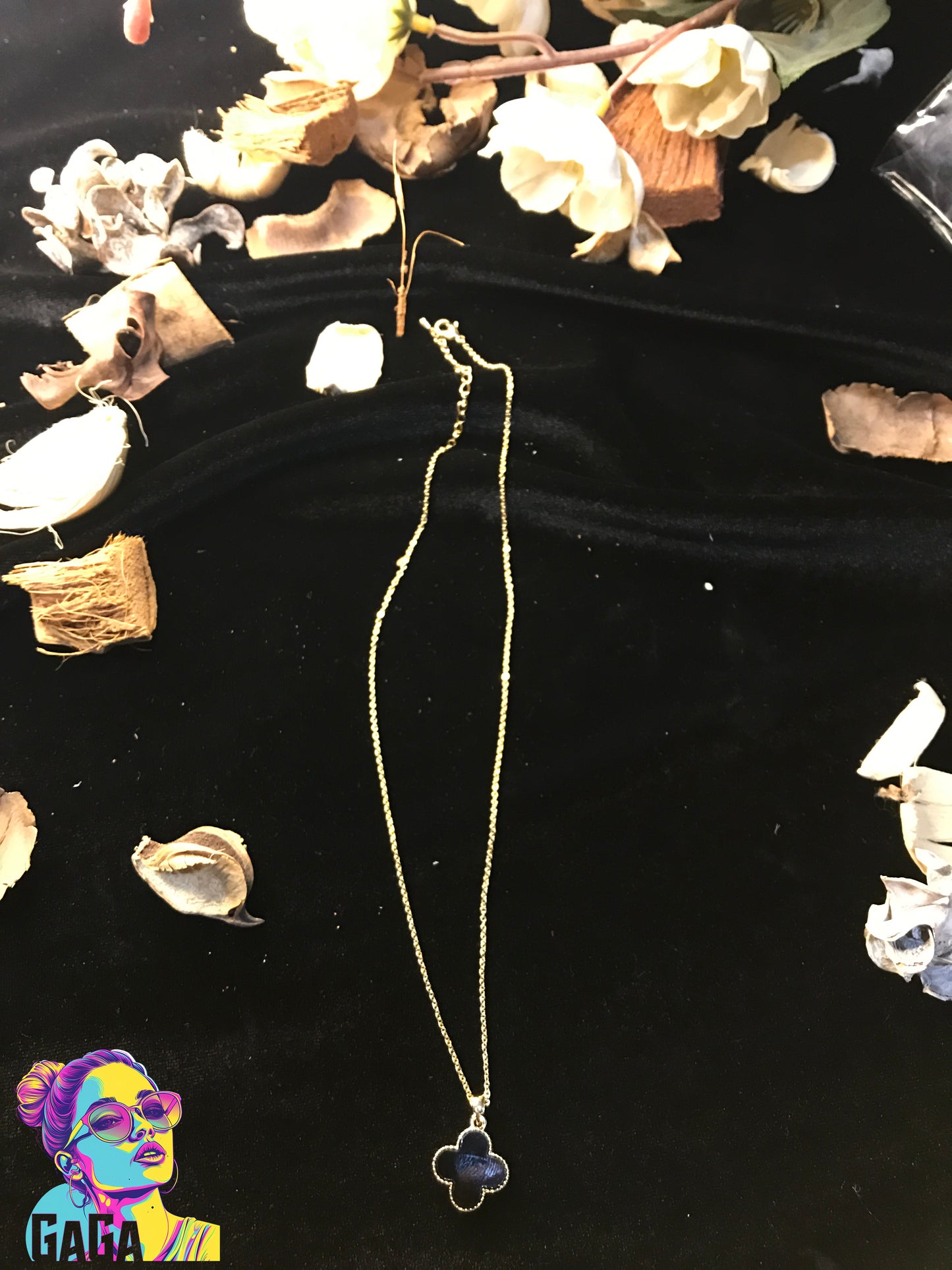 black vancleef necklace